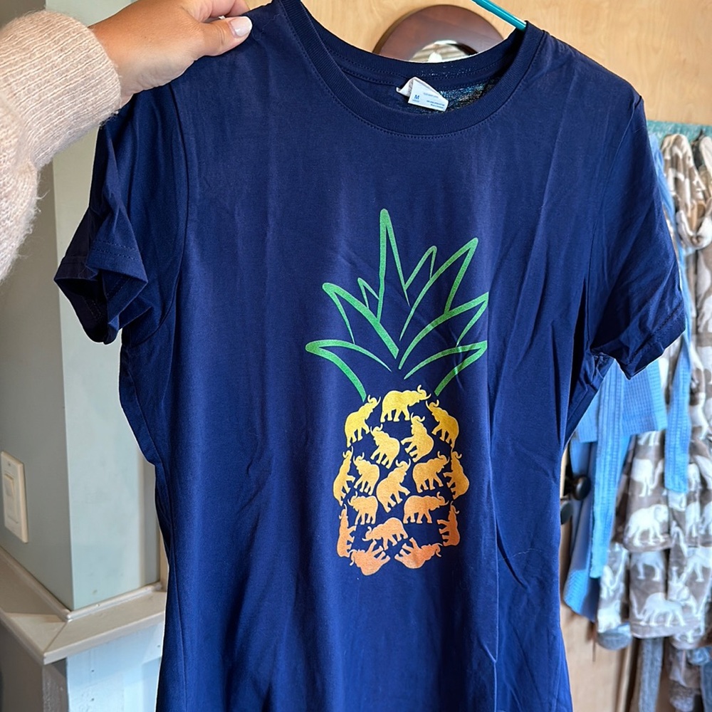 Port & Company short sleeve shirt. Elephant pineapple graphic. 100% cotton